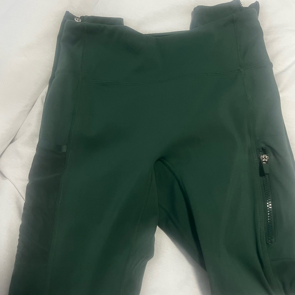 Fabletics all in motion Dark Green Zippered Leggings small